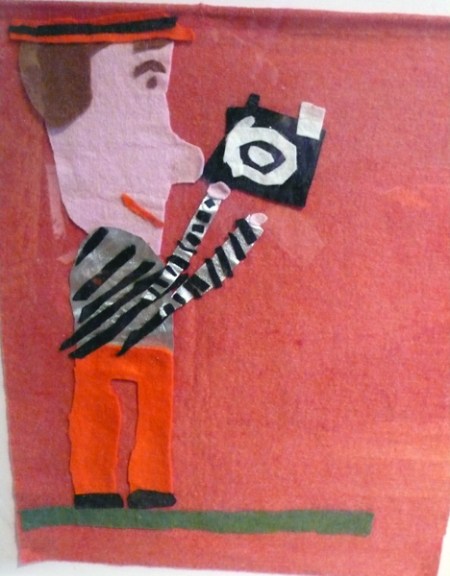 Even though Mike never really thought about being a photographer, when he was in the first grade, he made this little man out of felt. And dude is holding a camera. So I'm thinking maybe it was always meant to be...