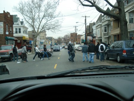 I have the light. But a whole crew of kids cross in front of me like they don't even see me. Hmph.