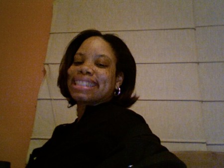 Nine months pregnant. Feet swollen. Belly huge. Hair cute!